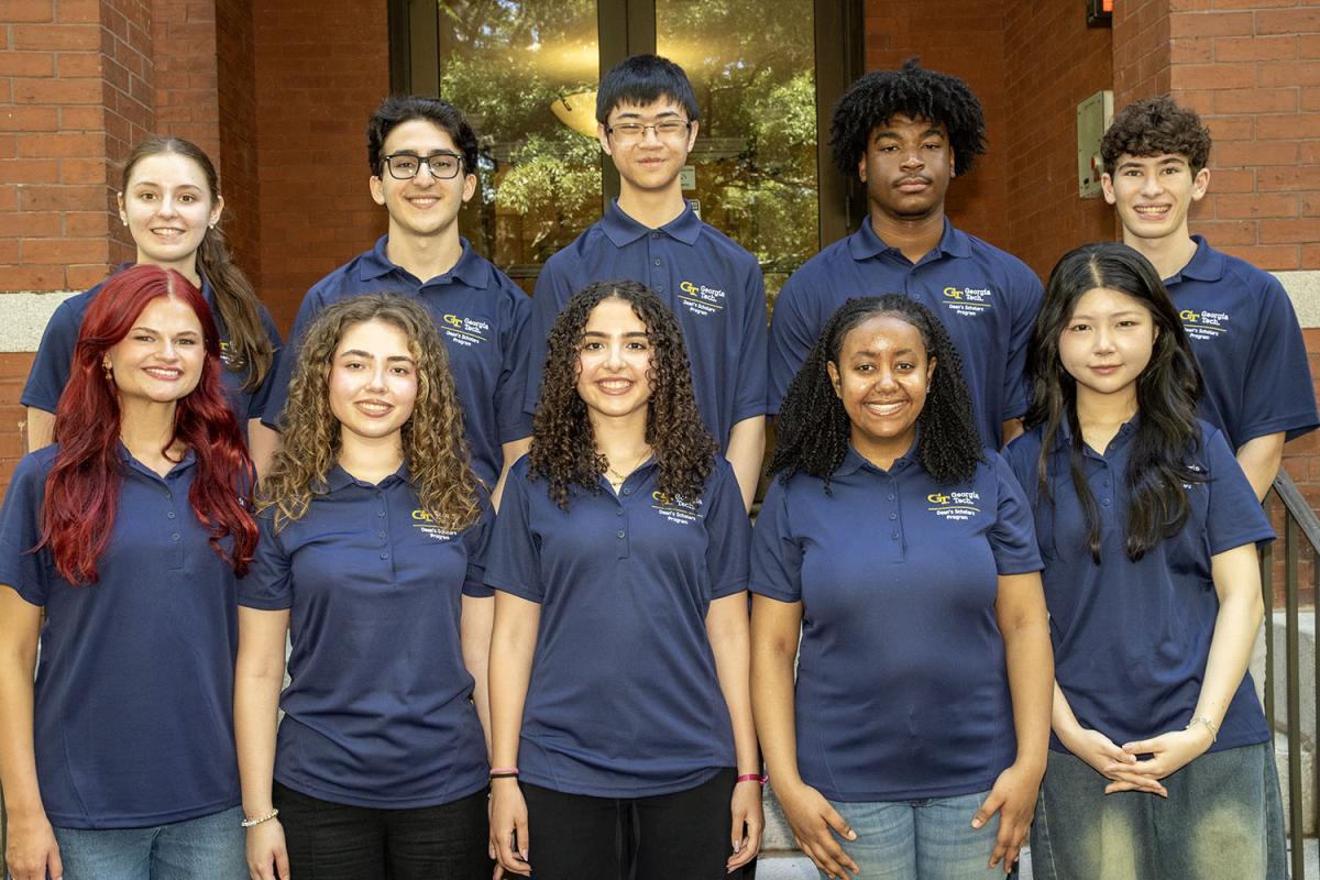 Dean Scholars group photo in front of tech tower